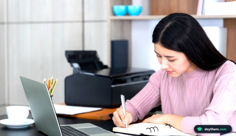 lifestyle beautiful Asian business young woman using laptop computer on office desk